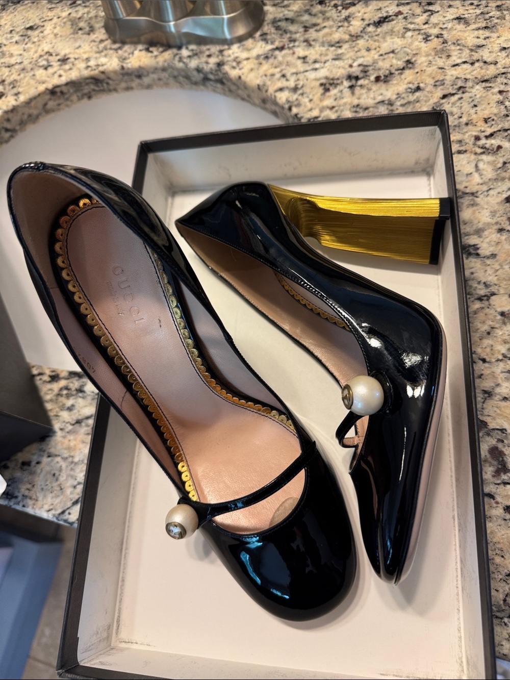 Gucci Black Patent Leather Pumps with Gold Sculpted Heel and Pearl Accent
